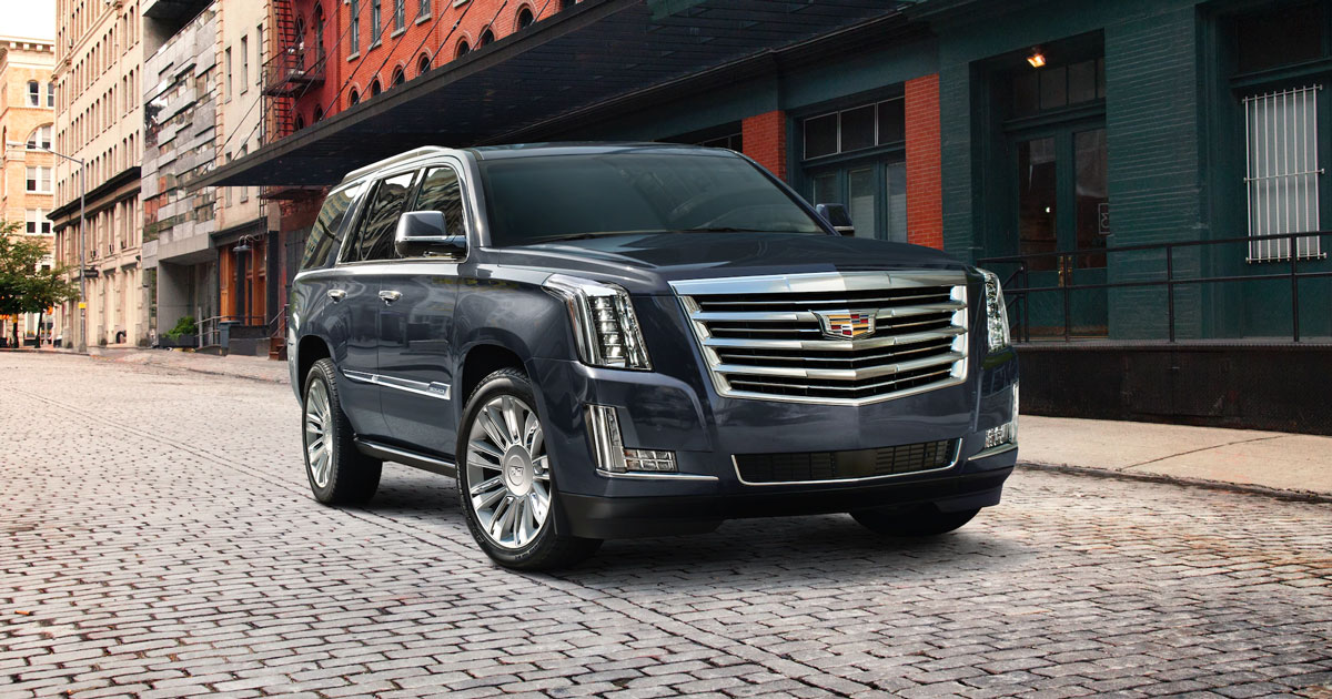 2020 Cadillac Escalade in black parked on a cobbled street