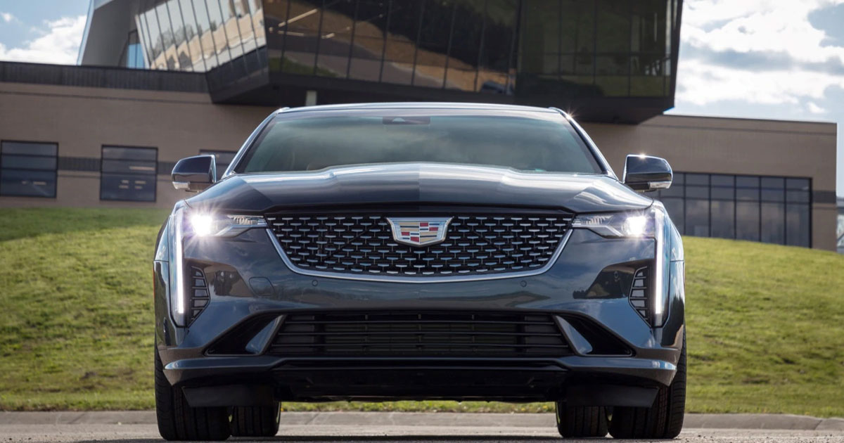 Black 2020 Cadillac CT4 parked in front of a house