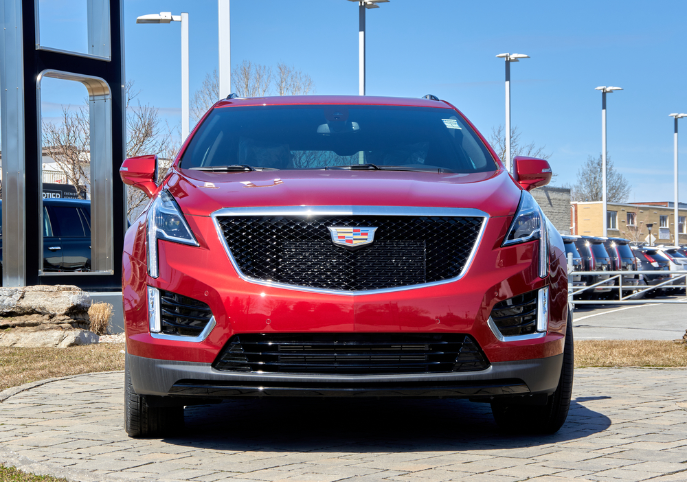 A Red Cadillac XT5 parked in a lot