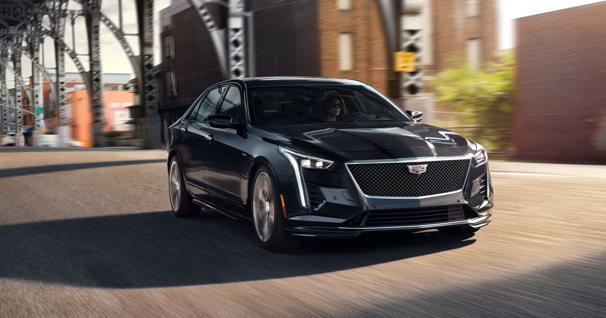 a black 2020 Cadillac CT6 driving down a road