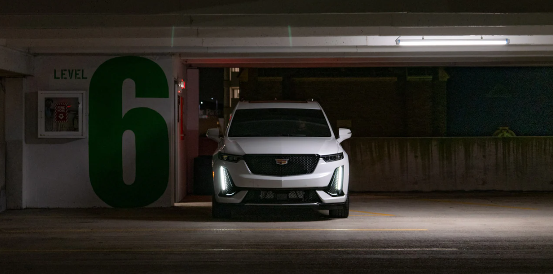 2021 Cadillac XT6 in white, in a parking garage